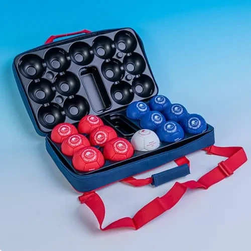 Open navy boccia case holding six red and six blue balls and one white target ball.