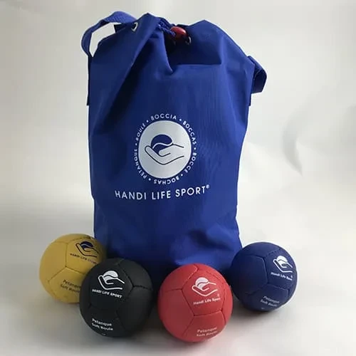 Eine blaue Handi Life Sport Tasche mit vier weichen Kugeln in Gelb, Schwarz, Rot und Blau.