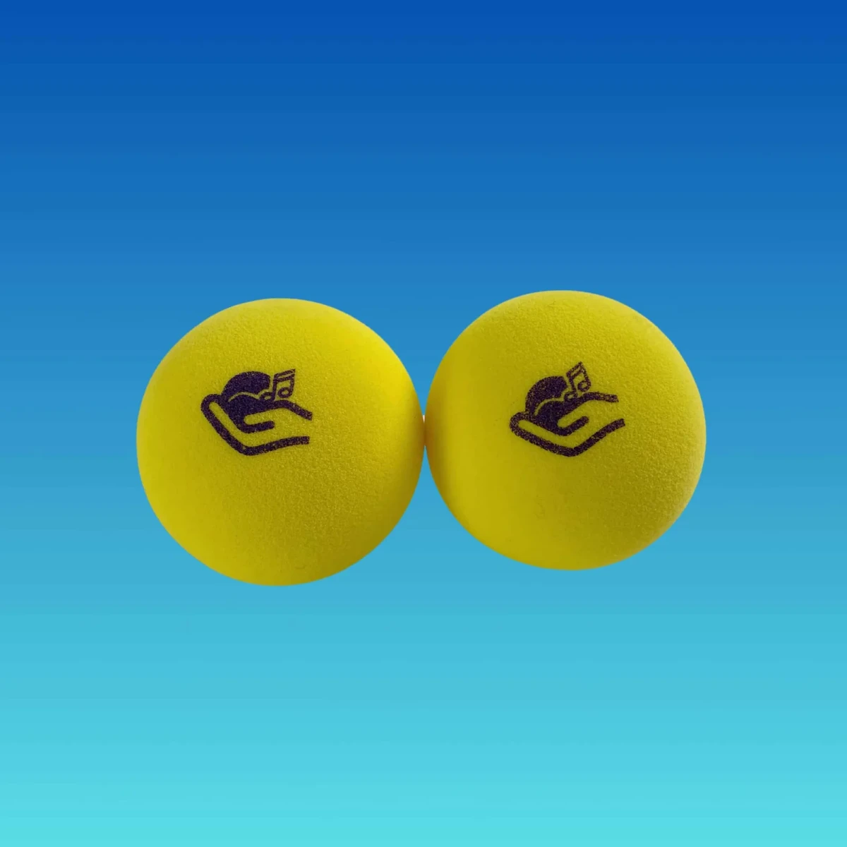 Two yellow foam blind-tennis balls (version 3.0) with the Handi Life Sport logo.