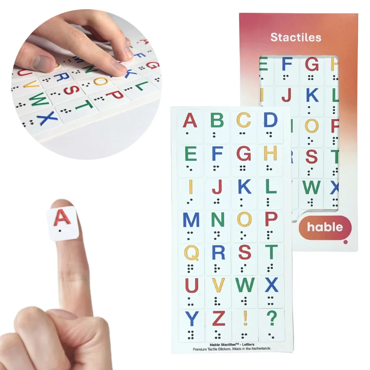 The Hable Stactiles Letters set: a white sheet of raised stickers showing the full alphabet A to Z plus exclamation and question marks, each coloured letter paired with Braille dots beneath it, shown with its orange box. A fingertip holds a single red letter A sticker and an inset shows fingers feeling the rows.