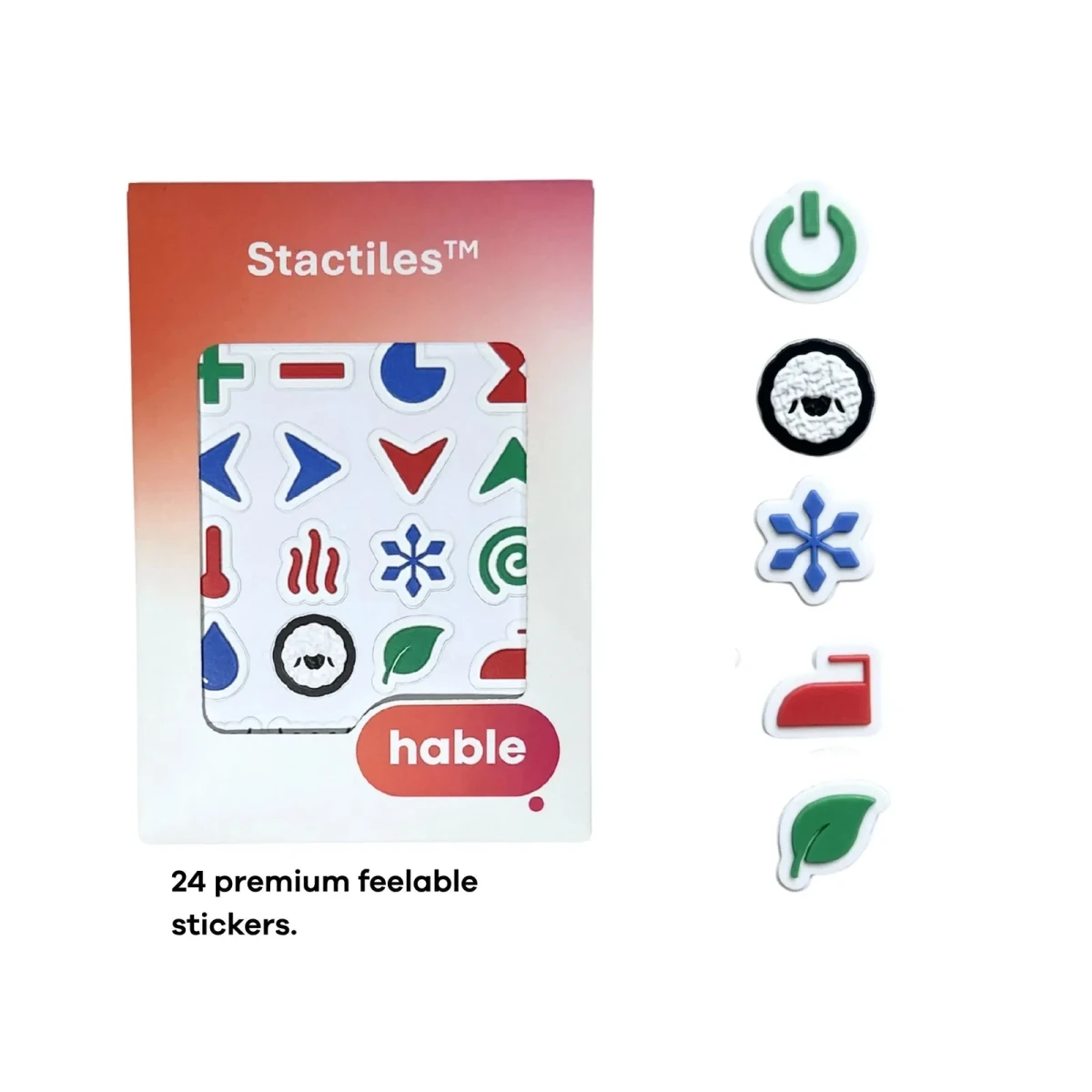 Das Hable Stactiles Waschblatt in seiner orangefarbenen Box, daneben eine vertikale Reihe von fünf vergrößerten Aufklebern: ein grüner Power-Button, ein schwarz umrandetes Wollschaf, eine blaue Schneeflocke, ein rotes Bügeleisen und ein grünes Blatt. Text lautet '24 premium fühlbare Aufkleber'.
