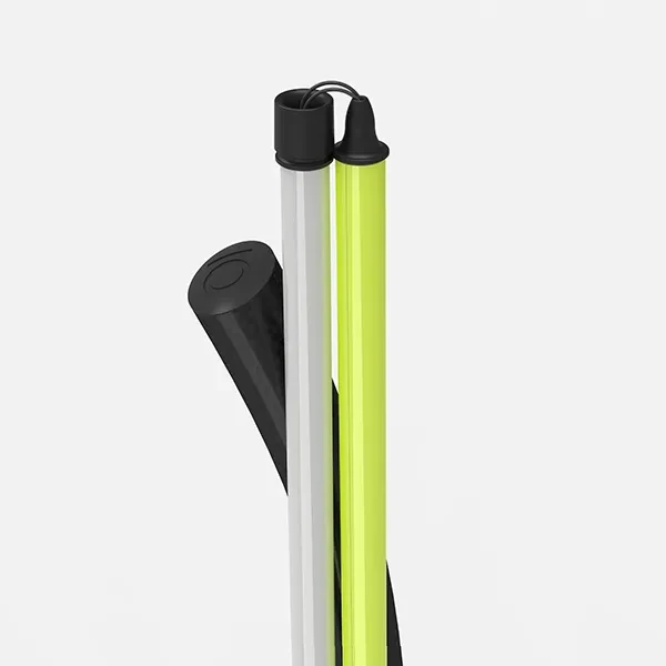 The handle and the two tube segments of the white cane IO, connected by an internal cord.