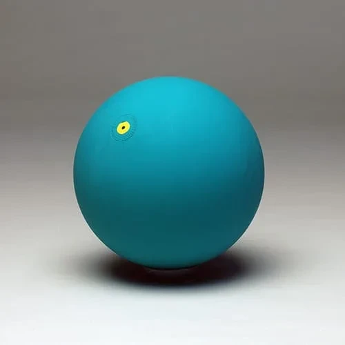 The green version: a matt deep teal-green ball with a small yellow valve disc.