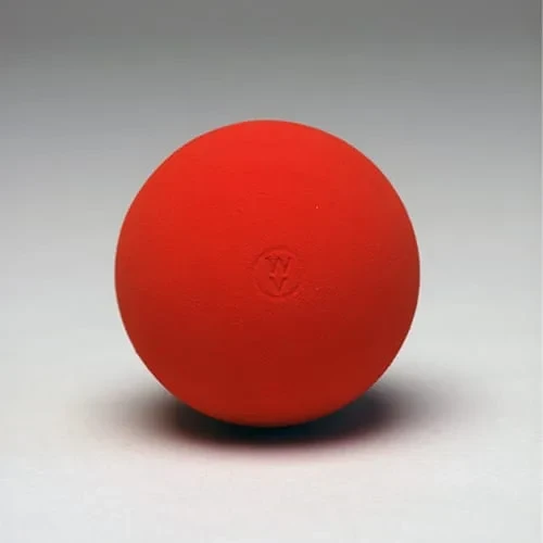 A smoother matt red-orange throwing ball with a small circular WV mark near the centre.