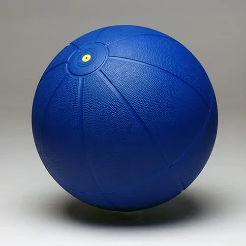 The 3 kg medicine ball in blue, with the same pebbled shell and yellow valve.
