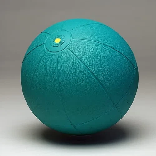 The green medicine ball, a deep teal-green with the same pebbled shell and yellow valve.