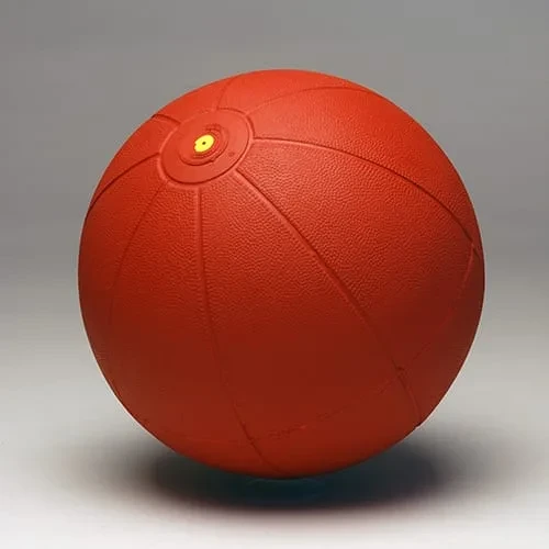 The red medicine ball, with a smoother finish and the same yellow valve at the top.